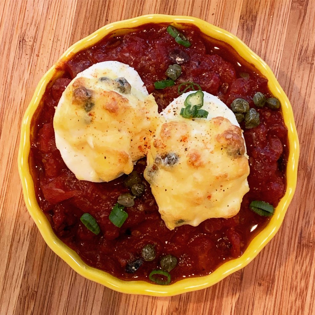 Baked Deviled Eggs with Tomato Sauce