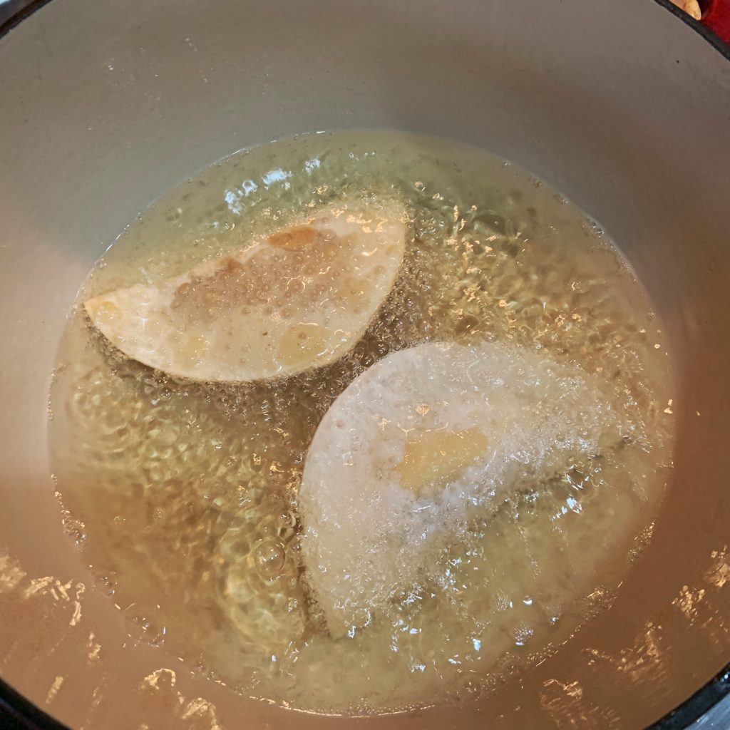 Frying empanadas